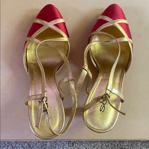 “Sacco” gold and red heels.